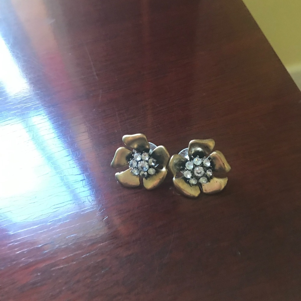 Vintage J Crew flower earrings. Antique gold tone with clear rhinestones. Signed